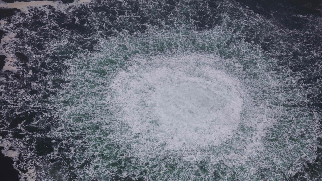 This handout photo taken on September 28, 2022 from an aircraft of the Swedish Coast Guard (Kustbevakningen) shows the release of gas emanating from a leak on the Nord Stream 1 gas pipeline, in the Swedish economic zone in the Baltic Sea. Picture: AFP