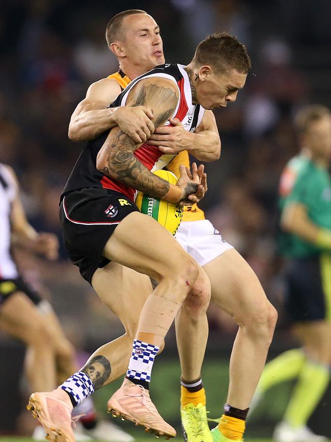 Hawthorn’s Tom Scully wraps up St Kilda forward Matt Parker. Picture: Michael Klein.