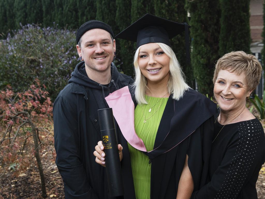 Bachelor of Education (Secondary) graduate Jade Huxham with partner Jay Medcalf and mum Tracee Shields at a UniSQ graduation ceremony at The Empire, Tuesday, June 25, 2024. Picture: Kevin Farmer