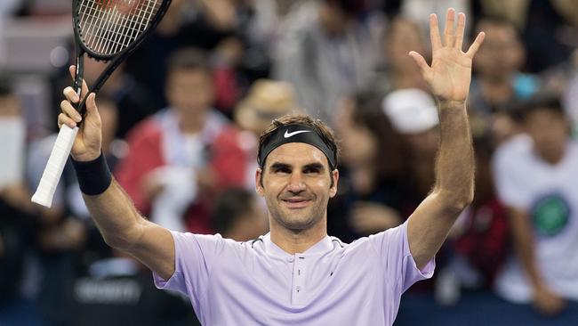 Roger Federer celebrates winning his match against Diego Schwartzman.