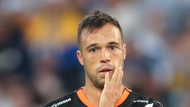 SYDNEY, AUSTRALIA - APRIL 10: Luke Brooks of the Wests Tigers looks dejected during the round six NRL match between Wests Tigers and Parramatta Eels at Accor Stadium on April 10, 2023 in Sydney, Australia. (Photo by Mark Metcalfe/Getty Images)