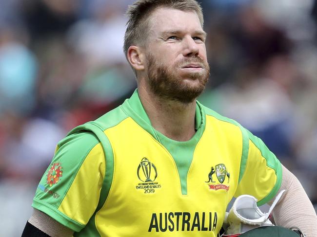 Australia's David Warner returns to the pavilion after being dismissed during the Cricket World Cup match between Australia and Bangladesh at Trent Bridge in Nottingham, England, Thursday, June 20, 2019. (AP Photo/Rui Vieira)