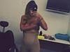 Lily Allen shocks with topless Spanx dance