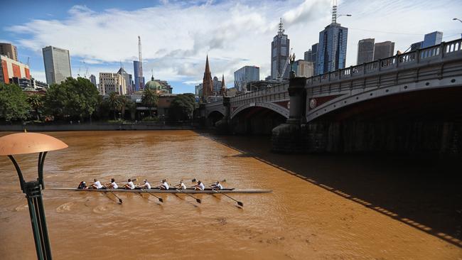 The Yarra River in Melbourne was turned a light brown after last week’s dust storm and rain. Picture: Alex Coppel.