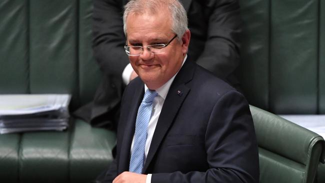 Prime Minister Scott Morrison put pressure on the Queensland government to reopen the state. (AAP Image/Mick Tsikas)