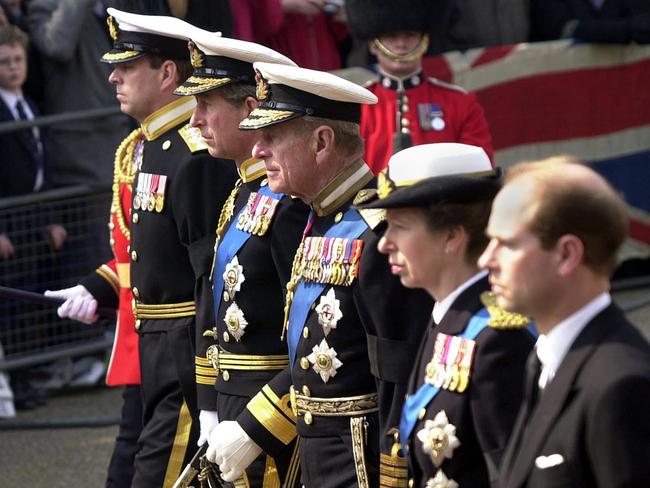 Prince Andrew, Prince Charles, Prince Philip, Princess Anne with Prince Edward walk behind the Queen Mother’s coffin in 2002. Picture: Supplied