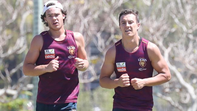 Lions Cam Raynor and Hugh McCluggage hit the track for pre-season training. Picture: Annette Dew