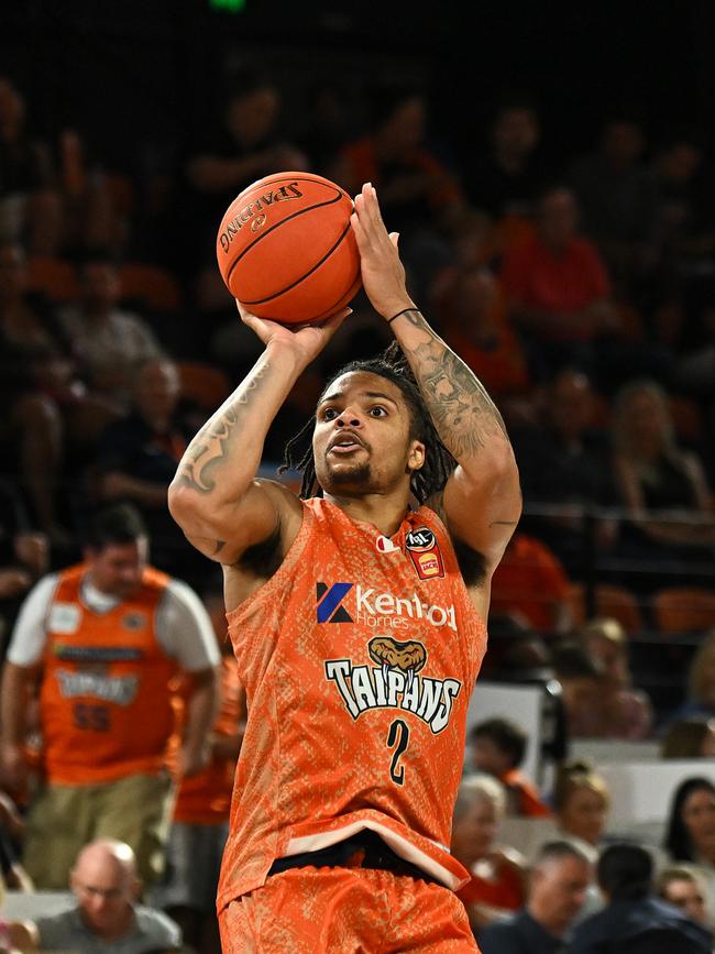 CAIRNS, AUSTRALIA - SEPTEMBER 28: Rob Edwards of the Taipans shoots a three during the round two NBL match between Cairns Taipans and Adelaide 36ers at Cairns Convention Centre, on September 28, 2024, in Cairns, Australia. (Photo by Emily Barker/Getty Images)