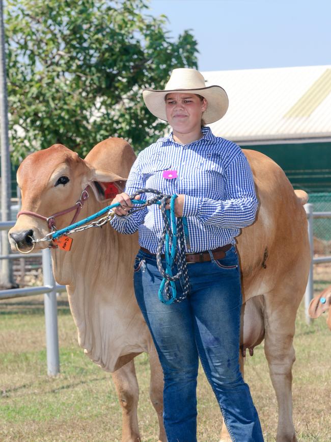 Sharnikwa Brown with prize winning Heifer ‘Roulette’ enjoying day two of the Royal Darwin Show. Picture: Glenn Campbell