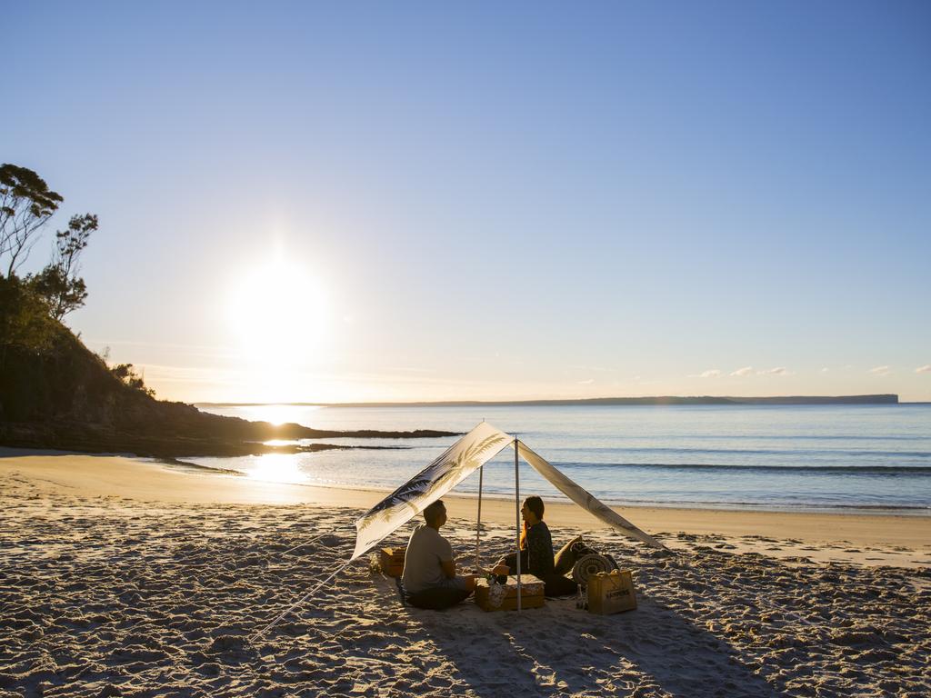 Nothing spells the end of a perfect getaway than a picnic on stunning Hyams Beach on the NSW South Coast. Picture: Destination NSW/Tim Clark.