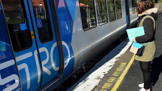 A petition to close the gap at Heyington Station after a Glen Iris teenager was killed there earlier this year is going round... general shots of the station and signs.