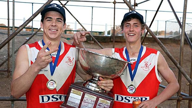 Matt Kennedy and Harry Perryman with 2015 premiership cup playing for Collingullie in Riverina Football League.