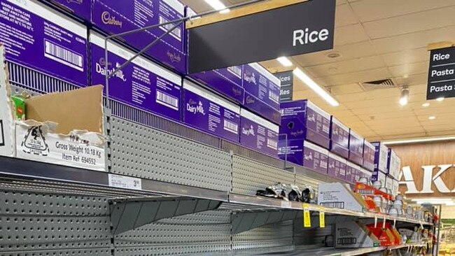 A Sydney council has waived curfews in a desperate bid to allow supermarket delivery trucks to replenish shelves around the clock as panic-buying continues.