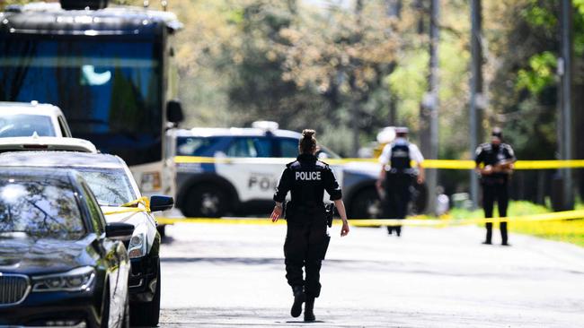 Toronto police patrol outside the home of Canadian rapper Drake after reports of a shooting. Picture: AFP.