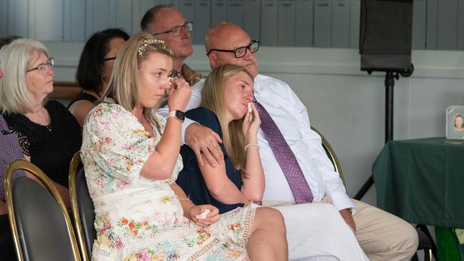 Demi, Gabbie and Paul Clark at the funeral service for John, Cynthia and Jacqueline Clark, held at Centenary Park, Snowtown. Picture: The Advertiser/ Morgan Sette