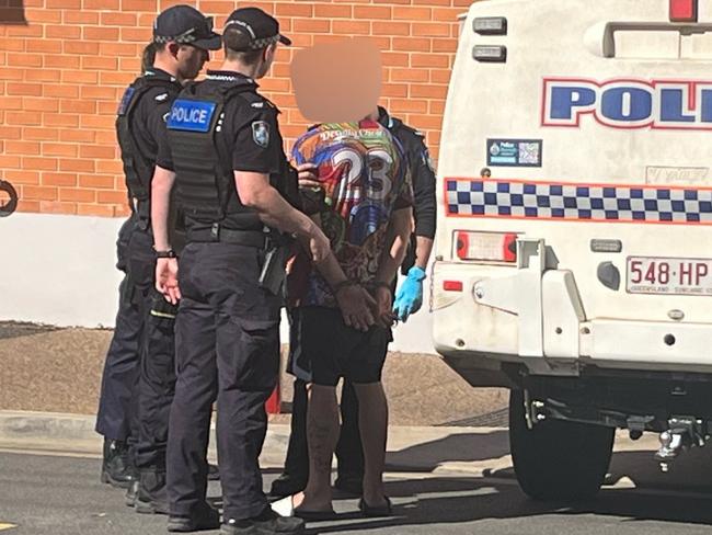 A man being arrested in Bazaar St, Maryborough, June 28, 2024.