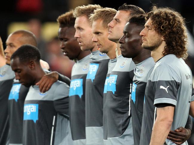 DUNEDIN, NEW ZEALAND - JULY 22: Newcastle United players pay tribute to the death of fans John Alder and Liam Sweeney during the international friendly match between Newcastle United and Sydney FC at Forsyth Barr Stadium on July 22, 2014 in Dunedin, New Zealand. (Photo by Rob Jefferies/Getty Images)