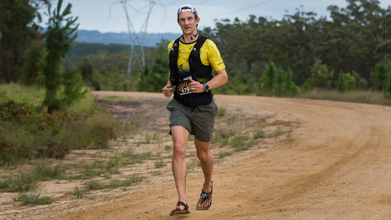 Sunshine Coast runner Sam Stow completing the Beerwah Daybreak marathon in Sandals. Picture: Steven O'Keefe/SOKImages