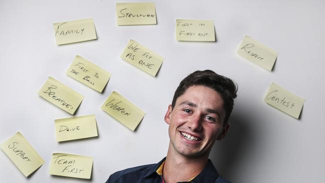 Crows player Chayce Jones, who according to his coach Matthew Nicks takes lots of notes during player meetings. Picture: Sarah Reed.