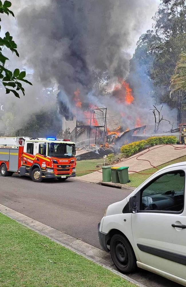 Emergency services rushed to the scene of a house fire in Nambour on Monday afternoon that destroyed one home and affected two others. Picture: Jacky Chipman