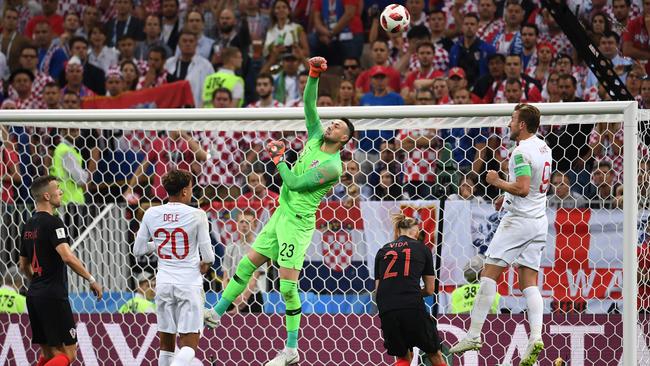 Croatia's goalkeeper Danijel Subasic (centre) punches the ball during the Russia 2018 World Cup semi-final football match against England. Photo: AFP