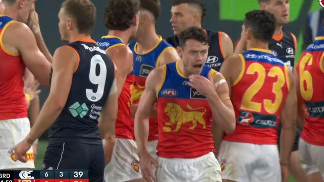 Lachie Neale reacts after the elbow.