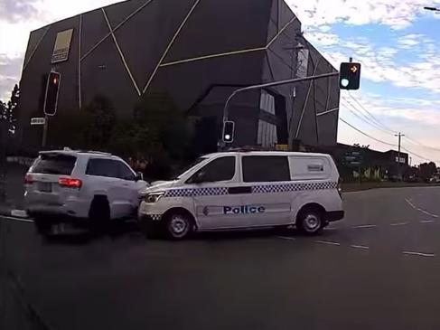 Driver's close call with police van