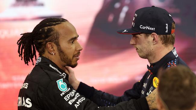 (L-R) Lewis Hamilton and Max Verstappen deep in discussion after the 2021 F1 Grand Prix of Abu Dhabi. Picture: Lars Baron/Getty Images