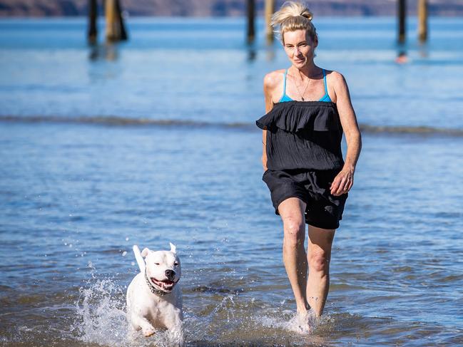 BUDGET- Boothby. Ainsley Jessop from Oaklands Park with dog Charlie (0404 173 097), on March 29th, 2022, at Brighton Beach.Picture: Tom Huntley