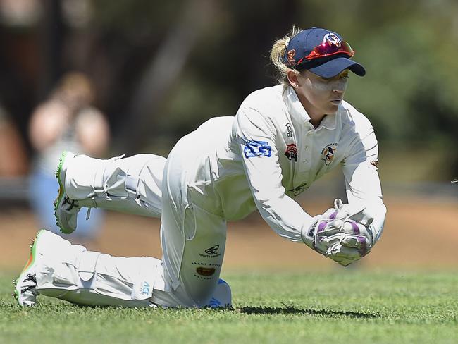 Women’s international wicketkeeper Sarah Taylor fields the ball during the weekend’s Grade Cricket clash between Northern Districts and Port Adelaide. Picture: David Mariuz