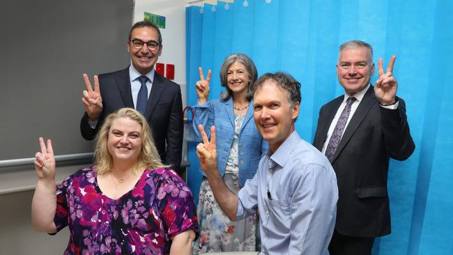 (LtoR front) Dr Caroline Phegan is joined by Professor Paul Worley, Executive Director of clinical innovation for the Local Health Network, SA Premier Steven Marshall, Chief Public Health Officer Professor Nicola Spurrier, and Health Minister Stephen Wade. Picture: NCA NewsWire / Dean Martin