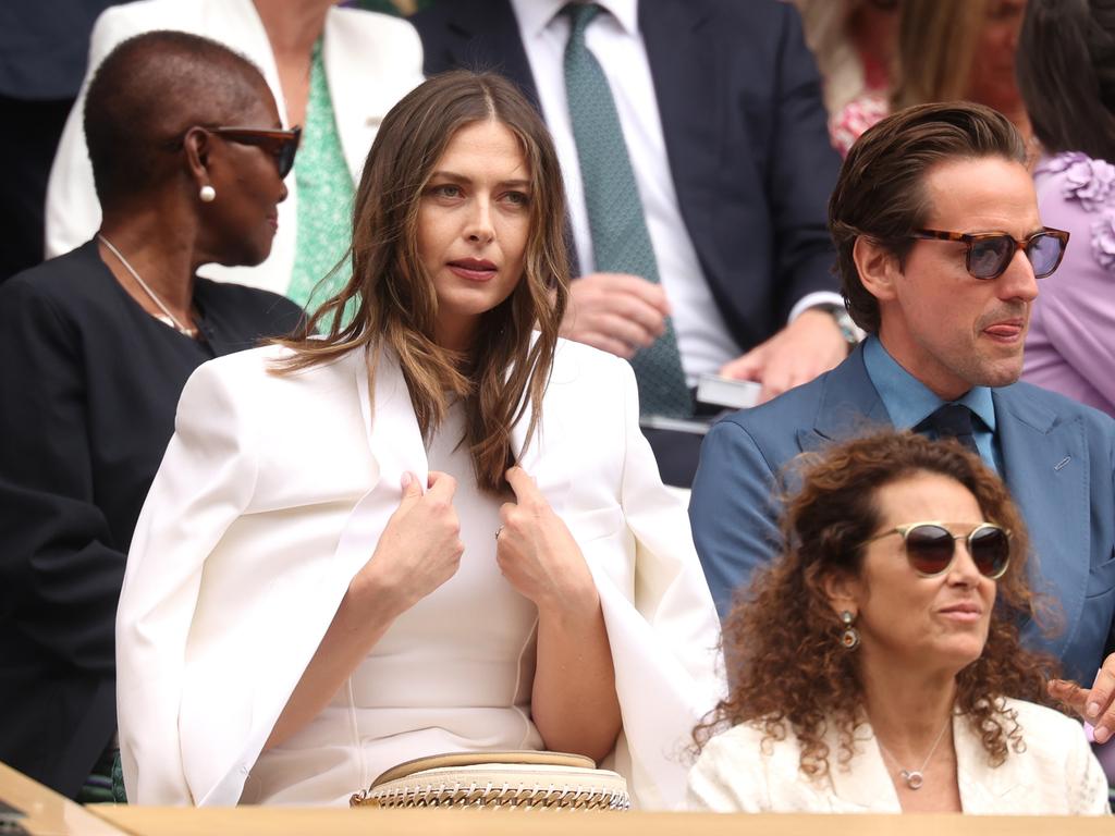 Former Wimbledon champion Maria Sharapova and husband Alexander Gilkes look on from the Royal Box. Picture: Getty Images