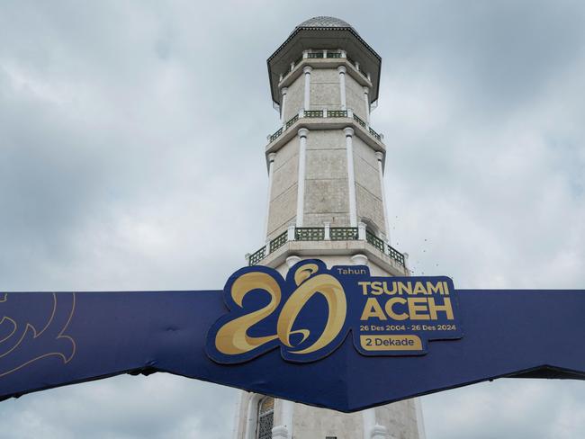 A sign commemorates the 20th anniversary of the tsunami at the Baiturrahman Grand Mosque in Banda Aceh. Picture: AFP