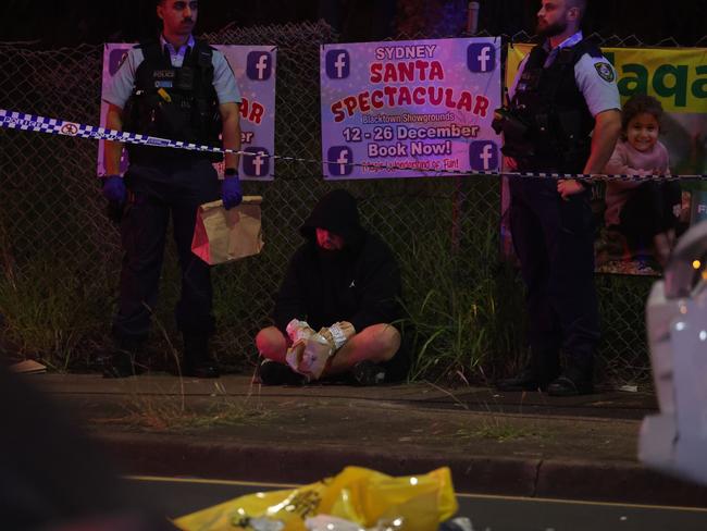 Two men were detained at the scene. Picture: Rohan Kelly