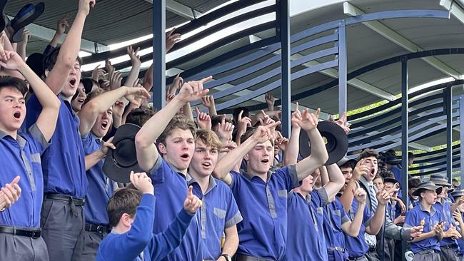 Churchie supporters cheer on their side.