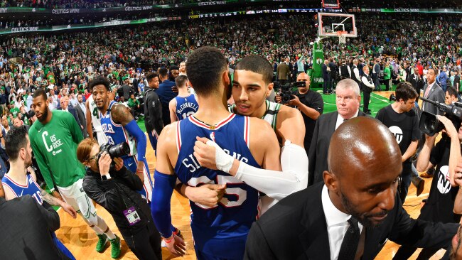 BOSTON, MA - MAY 9: Jayson Tatum #0 of the Boston Celtics and Ben Simmons #25 of the Philadelphia 76ers hug after the game during Game Five of the Eastern Conference Semifinals of the 2018 NBA Playoffs on May 9, 2018 at the TD Garden in Boston, Massachusetts. NOTE TO USER: User expressly acknowledges and agrees that, by downloading and or using this photograph, User is consenting to the terms and conditions of the Getty Images License Agreement. Mandatory Copyright Notice: Copyright 2018 NBAE (Photo by Jesse D. Garrabrant/NBAE via Getty Images)
