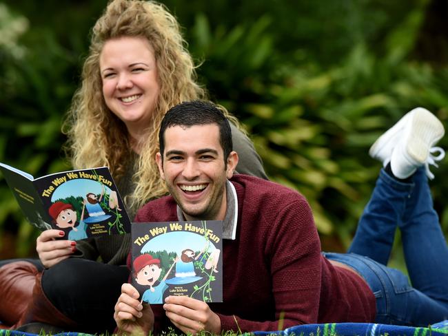 Stacey Bennett and Luke Scicluna with their book The Way We Have Fun. Picture: Kylie Else