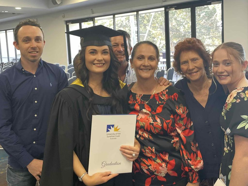 Kacie Kraut and her family at the University of the Sunshine Coast graduation ceremony at the Beach House Hotel on October 12, 2023.