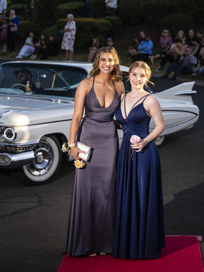 Tahnee Madden (left) and Bethany Lane at Harristown State High School formal at Highfields Cultural Centre, Friday, November 18, 2022. Picture: Kevin Farmer