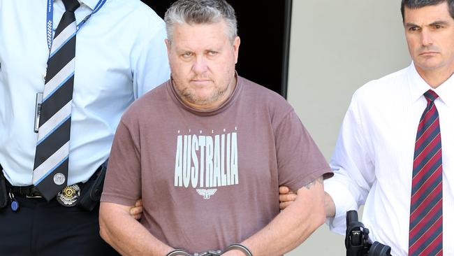 Foster father Rick Thorburn leaves Logan Central police station yesterday. Pictures: Jack Tran