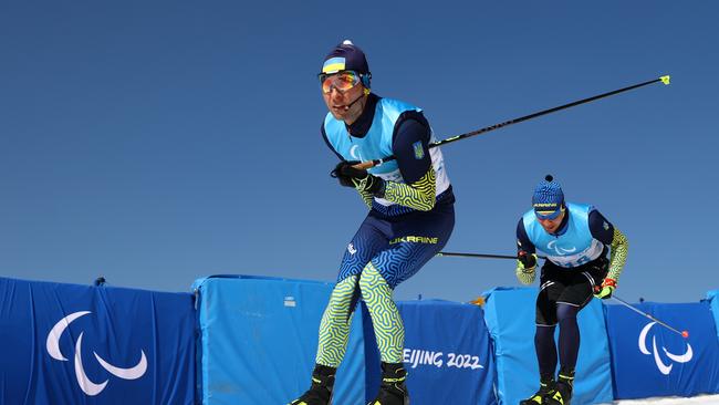 Visually Impaired athlete Laroslav Reshetynskyi of Team Ukraine aided by guide Kostiantyn Yaremenko.