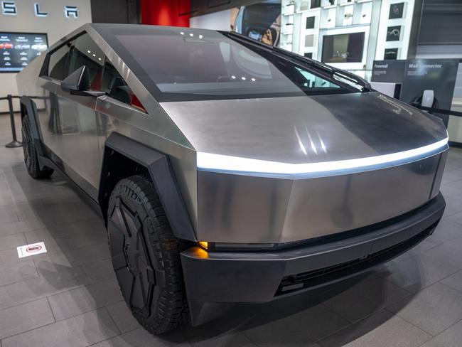 A Tesla Cybertruck at a Tesla store in San Jose, California, US, on Tuesday, Nov. 28, 2023. The first Cybertruck customers will receive the vehicles during a launch event at Tesla's Austin headquarters this week. Photographer: David Paul Morris/Bloomberg via Getty Images