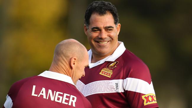 Mal Meninga and Langer enjoy a laugh during Maroons training.