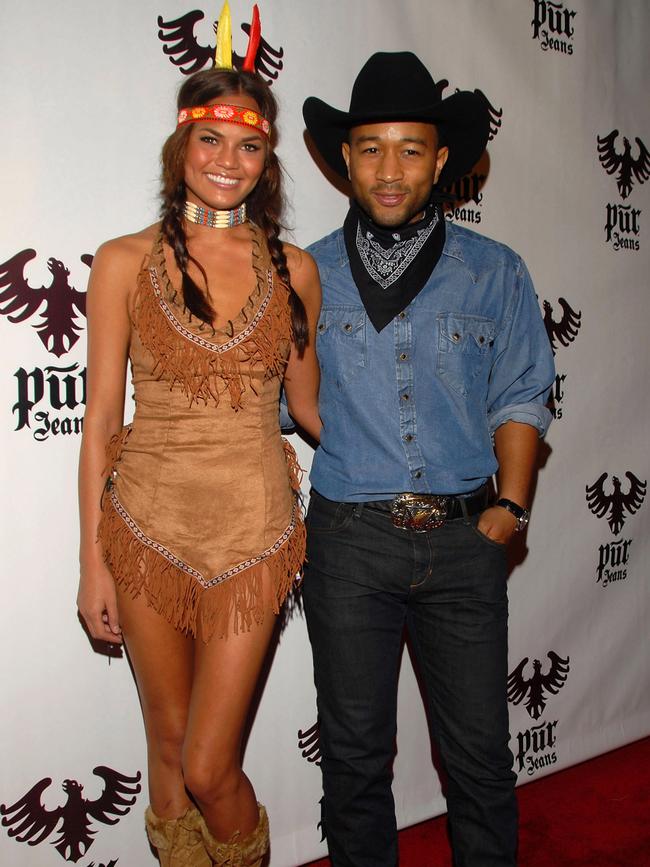 Model Chrissy Teigen and husband John Legend attends the Pur Jeans Halloween Bash in 2008.