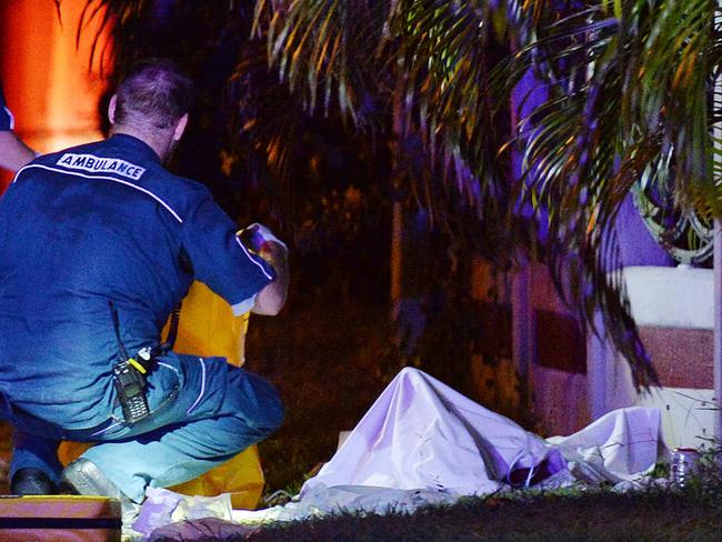 Man fatally Stabbed in Ackers Street Hermit Park. Paramedics work on the man