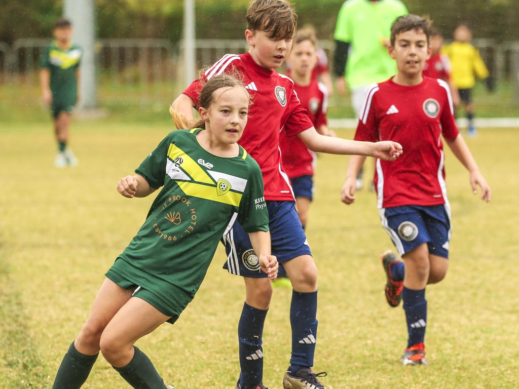 QAS V Michelton FC in the Premier Invitational Football Carnival at Nerang. Picture: Glenn Campbell