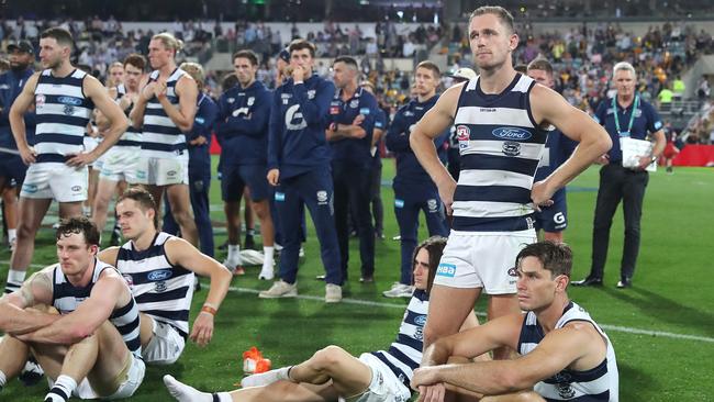 Geelong's Joel Selwood stands with teammates after the loss. Picture: Sarah Reed