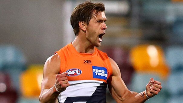BRISBANE, AUSTRALIA - SEPTEMBER 12: Matt de Boer of the Giants celebrates a goal during the round 17 AFL match between the Greater Western Sydney Giants and the Melbourne Demons at The Gabba on September 12, 2020 in Brisbane, Australia. (Photo by Jono Searle/AFL Photos/via Getty Images)