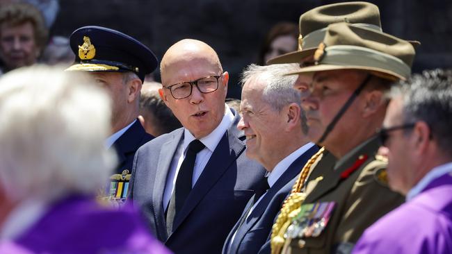 Peter Dutton and Bill Shorten chat after the service. Picture: NewsWire/Ian Currie