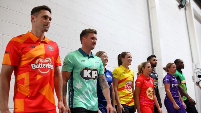 England’s male and female stars model the colourful uniforms which will be on show in The Hundred. Picture: Getty